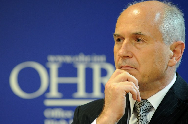 High Representative of the International community in Bosnia, Austrian diplomat Valentin Inzko, looks on during a press conference in Sarajevo, on May 23, 2012, where was announced the decision of Supervision activity in the Administrative District of Brcko, in Northern Bosnia. The decision was made during a two-day meeting by Peace Implementation Committee. The Office of The High Representative in Brcko is to be closed but OHR's supervisor US diplomat Roderick Moore still remains in Bosnia with a "hands-off" approach to monitoring further political development in District of Brcko. This decision is considered to be the first step on the way to a complete conclusion of International supervision of the district. AFP PHOTO/ ELVIS BARUKCIC