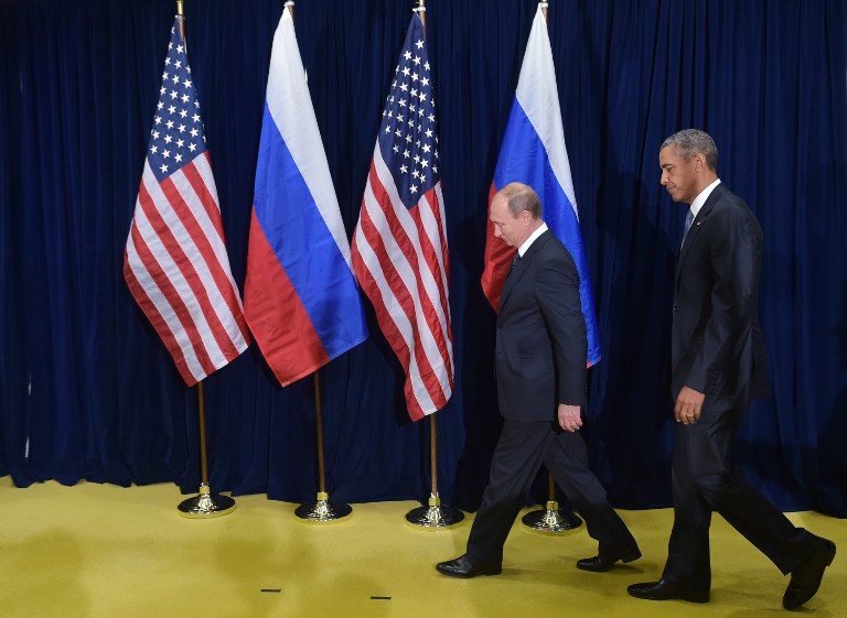 US President Barack Obama and Russia's President Vladimir Putin walk out for a photo op ahead of a bilateral meeting on the sidelines of the 70th session of the UN General Assembly at the United Nations headquarters on September 28, 2015 in New York. AFP PHOTO/MANDEL NGAN