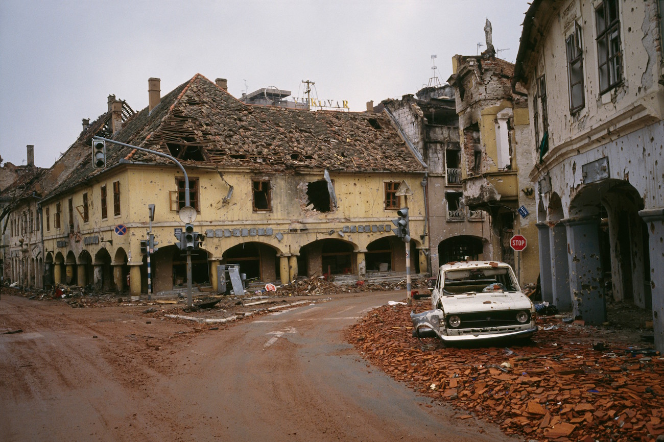 Bombed buildings are riddled with bullet holes and streets are filled with rubble after a three-month battle between the Croatian armed forces and the Yugoslavian Federal Army in Vukovar. The Yugoslavian Federal Army completely destroyed the Croatian city and killed thousands of civilians., Image: 15114628, License: Rights-managed, Restrictions: Content available for editorial use, pre-approval required for all other uses. This content may not be materially modified or used in composite content., Model Release: no, Credit line: Profimedia, Corbis