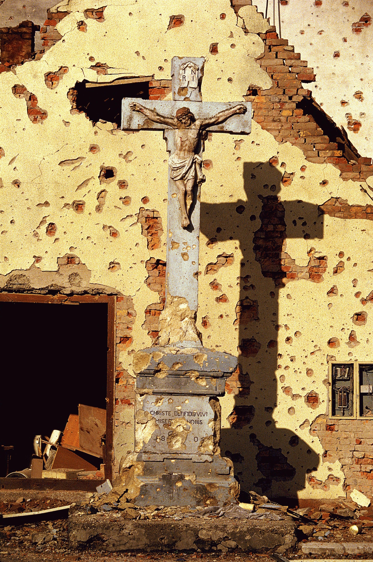 Violence and Destruction - A destroyed Roman Catholic cross in Vukovar, Croatia, Nov. 25, 1991. Vukovar was under siege for three months by Serbian forces and was completely destroyed., Image: 116177945, License: Rights-managed, Restrictions: Content available for editorial use, pre-approval required for all other uses. This content not available to be downloaded through Quick Pic Not available for license and invoicing to customers located in the Czech Republic. Not available for license and invoicing to customers located in the Netherlands. Not available for license and invoicing to customers located in India. Not available for license and invoicing to customers located in Italy. Not available for license and invoicing to customers located in Finland., Model Release: no, Credit line: Profimedia, Corbis VII