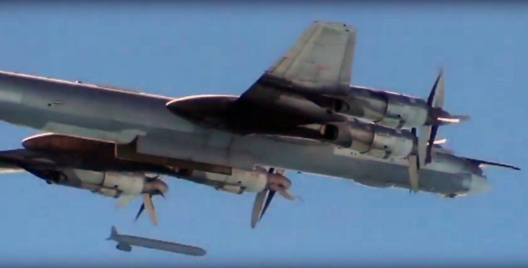 A video grab made on November 19, 2015, shows an image taken from a footage made available on the Russian Defence Ministry's official Facebook page on November 19, 2015, purporting to show a Russian Tupolev Tu-95 turboprop-powered strategic bomber dropping a cruise missile during an airstrike in Syria. AFP PHOTO / RUSSIAN DEFENCE MINISTRY RESTRICTED TO EDITORIAL USE - MANDATORY CREDIT " AFP PHOTO / RUSSIAN DEFENCE MINISTRY" - NO MARKETING NO ADVERTISING CAMPAIGNS - DISTRIBUTED AS A SERVICE TO CLIENTS / AFP / RUSSIAN DEFENCE MINISTRY / -