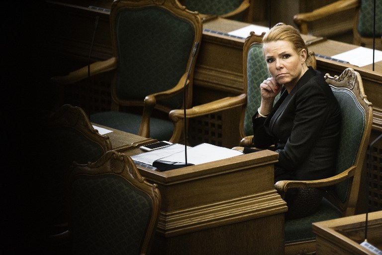 Denmark's Minister of Immigration and Integration Inger Stojberg listen to the debate in the Danish Parliament in Copenhagen on January 26, 2016. Despite widespread condemnation, Denmark's parliament is expected to vote Tuesday in favour of drastic reforms curbing asylum seekers' rights, including delaying family reunifications and confiscating migrants' valuables. / AFP / Scanpix Denmark / Mathias Lovgreen Bojesen / Denmark OUT