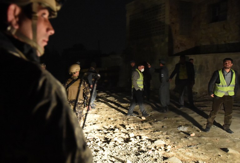 Afghan security officials arrive at the site of a suicide car bomb attack at a French restaurant- Le Jardin in Kabul on January 1, 2016. A Taliban suicide car bomber raided a French restaurant popular with foreigners in Kabul, in a New Year's day attack that marks the latest in a series of brazen insurgent assaults.There was no immediate confirmation of casualties from the attack on Le Jardin, an Afghan-owned eatery, which caused a piercingly loud explosion and left a building engulfed in flames. AFP PHOTO/Wakil Kohsar / AFP / WAKIL KOHSAR