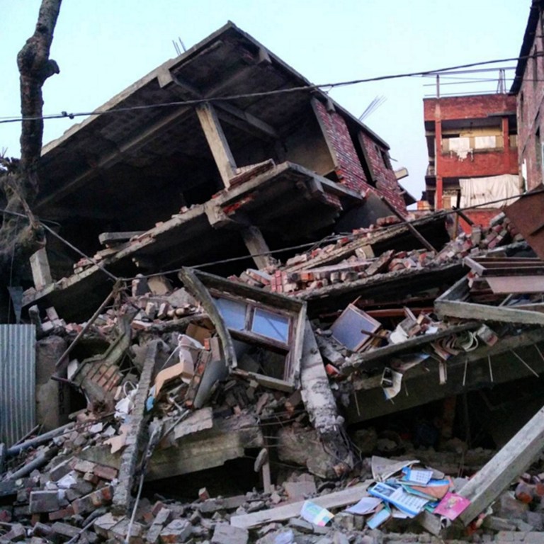 This picture taken from Instagram shows damage from a strong 6.7 magnitude earthquake which struck northeast India near the country's borders with Myanmar and Bangladesh in the city of Imphal, capital of Manipur state early on January 4, 2016. The early morning tremor was strongly felt across northeast India and in the Bangladeshi capital Dhaka, where television reports said at least 24 people were taken to hospital after being injured in the scramble that ensued. AFP PHOTO / Deepak Shijagurumayum RESTRICTED TO EDITORIAL USE - MANDATORY CREDIT " AFP PHOTO / Deepak Shijagurumayum" - NO MARKETING NO ADVERTISING CAMPAIGNS - DISTRIBUTED AS A SERVICE TO CLIENTS - NO ARCHIVES / AFP / Deepak Shijagurumayum