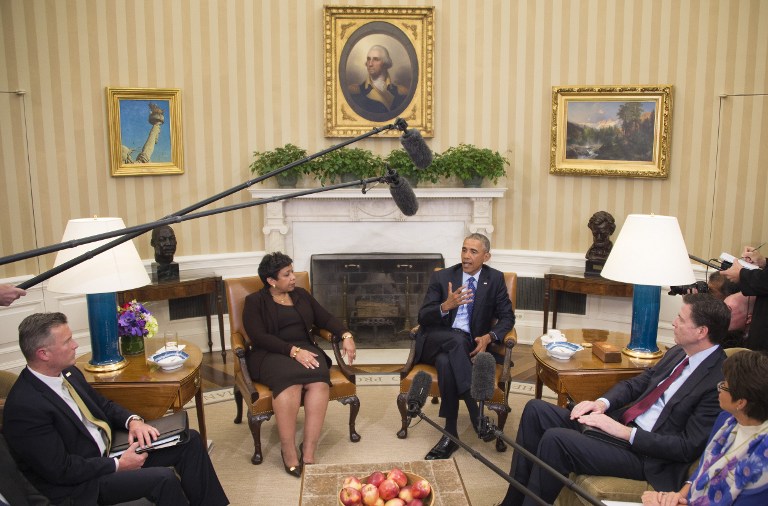 US President Barack Obama speaks with Acting ATF Director Thomas E. Brandon (L), Attorney Genral Loretta Lynch (2nd L), and Director of the Federal Bereau of Investigation James Comey (R) in the Oval Office of the White House in Washington, DC, January 4, 2016. President Barack Obama is poised to unveil a raft of executive actions to tackle US gun violence, kicking-off his last year in the White House with a show of political power. Frustrated at the unbending political opposition to gun control, despite the American scourge of mass shootings, Obama is now looking to bypass Congress with executive steps that aides say will focus on regulating gun sales and curbing illegal purchases. The proposals -- being presented to Obama by Attorney General Loretta Lynch at the White House Monday -- could tighten rules on gun dealers and crack down on "straw purchases" in which potentially suspect individuals buy guns through an intermediary. AFP PHOTO / JIM WATSON / AFP / JIM WATSON