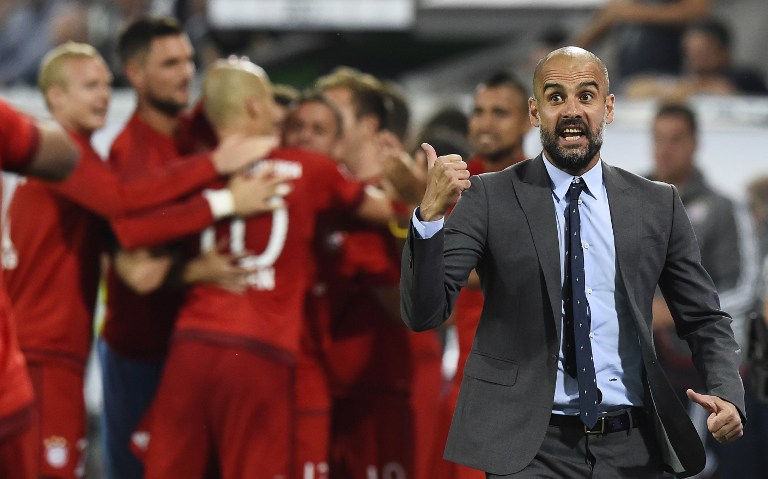 Bayern Munich's Spanish head coach Pep Guardiola reacts during the German Supercup football match VfL Wolfsburg vs Bayern Munich in Wolfsburg, central Germany, on August 1, 2015. AFP PHOTO / TOBIAS SCHWARZ DFL RULES TO LIMIT THE ONLINE USAGE DURING MATCH TIME TO 15 PICTURES PER MATCH. IMAGE SEQUENCES TO SIMULATE VIDEO IS NOT ALLOWED AT ANY TIME. FOR FURTHER QUERIES PLEASE CONTACT DFL DIRECTLY AT + 49 69 650050. / AFP / TOBIAS SCHWARZ