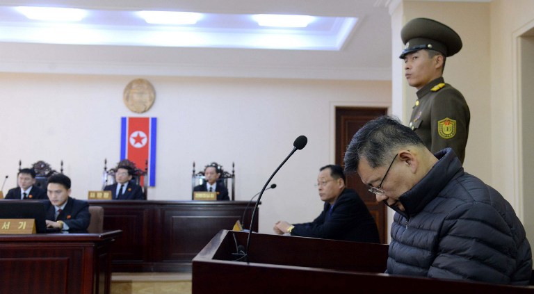 This picture taken by North Korea's official Korean Central News Agency (KCNA) on December 16, 2015 shows Canadian pastor Hyeon Soo Lim (R) at the North Korean Supreme Court in Pyongyang. A North Korean court has sentenced a Canadian pastor to life imprisonment with hard labour, while rejecting a prosecution call for the death penalty after his conviction on sedition charges. South Korean-born Hyeon Soo Lim, pastor at the Light Korean Presbyterian Church in Toronto, is the latest in a series of foreign missionaries to be arrested, deported or jailed for allegedly meddling in state affairs. AFP PHOTO / KCNA via KNS REPUBLIC OF KOREA OUT THIS PICTURE WAS MADE AVAILABLE BY A THIRD PARTY. AFP CAN NOT INDEPENDENTLY VERIFY THE AUTHENTICITY, LOCATION, DATE AND CONTENT OF THIS IMAGE. THIS PHOTO IS DISTRIBUTED EXACTLY AS RECEIVED BY AFP. ---EDITORS NOTE--- RESTRICTED TO EDITORIAL USE - MANDATORY CREDIT "AFP PHOTO / KCNA VIA KNS" - NO MARKETING NO ADVERTISING CAMPAIGNS - DISTRIBUTED AS A SERVICE TO CLIENTS / AFP / KCNA / KNS