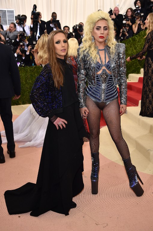 NEW YORK, NY - MAY 02: Allegra Versace Beck (L)and Lady Gaga attend the "Manus x Machina: Fashion In An Age Of Technology" Costume Institute Gala at Metropolitan Museum of Art on May 2, 2016 in New York City. Dimitrios Kambouris/Getty Images/AFP
