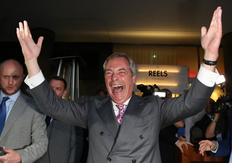 Leader of the United Kingdom Independence Party (UKIP), Nigel Farage reacts at the Leave.EU referendum party at Millbank Tower in central London on June 24, 2016, as results indicate that it looks likely the UK will leave the European Union (EU). Top anti-EU campaigner Nigel Farage said he was increasingly confident of victory in Britain's EU referendum on Friday, voicing hope that the result "brings down" the European Union. / AFP PHOTO / GEOFF CADDICK