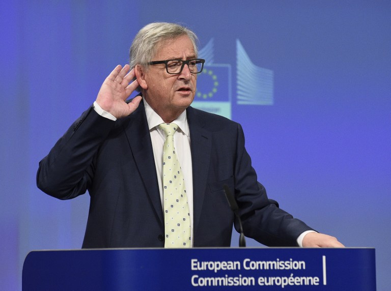 European Commission chief Jean-Claude Juncker gestures during a joint press conference following his meeting with the President of the European Parliament, the President of the European Council and the Dutch Prime Minister at the EU Headquarters in Brussels on June 24, 2016. European Commission chief Jean-Claude Juncker on June 24, 2016 denied that Britain's shock vote to leave the EU was the start of a process of disintegration for the bloc. / AFP PHOTO / JOHN THYS
