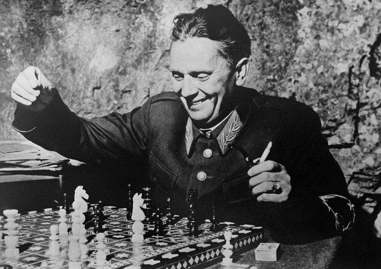 Yugoslav President Marshall Josip Broz Tito is seen playing chess on a picture taken in october 1944 during World War II. / AFP PHOTO