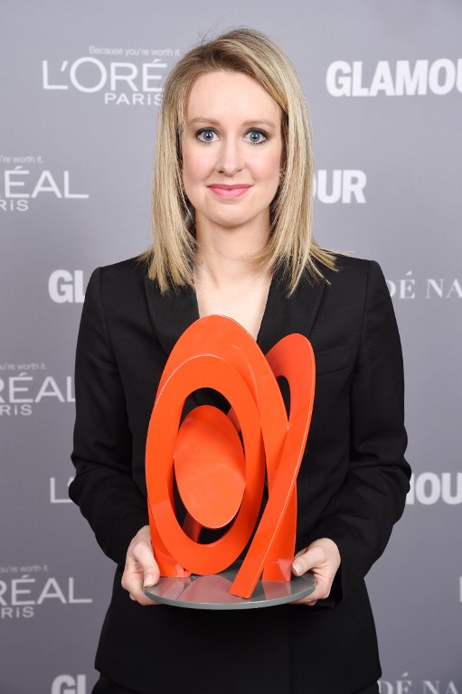 NEW YORK, NY - NOVEMBER 09: Honoree Elizabeth Holmes poses backstage with her award at the 2015 Glamour Women Of The Year Awards at Carnegie Hall on November 9, 2015 in New York City. Dimitrios Kambouris/Getty Images for Glamour/AFP