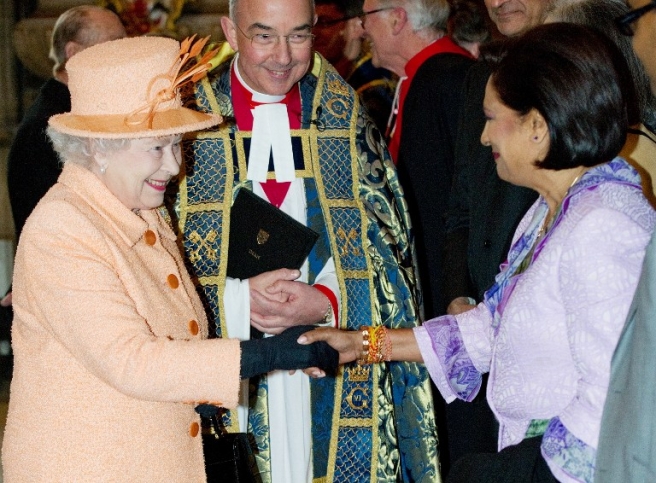 Britain's Queen Elizabeth II (L) meets The Prime Minister of the Republic of Trinidad and Tobago Kamal Persad-Bissessar before the annual Commonwealth Day Observance Service at Westminster Abbey in central London, England, on March 14, 2011. The overall theme for this years Observance was Women as Agents of Change. AFP PHOTO/Leon Neal/WPA POOL / AFP PHOTO / POOL / LEON NEAL