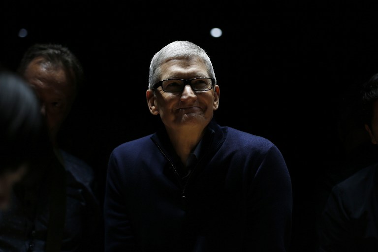 CUPERTINO, CA - OCTOBER 27: Apple CEO Tim Cook smiles during a product launch event on October 27, 2016 in Cupertino, California. Apple Inc. unveiled the latest iterations of its MacBook Pro line of laptops and TV app.   Stephen Lam/Getty Images/AFP