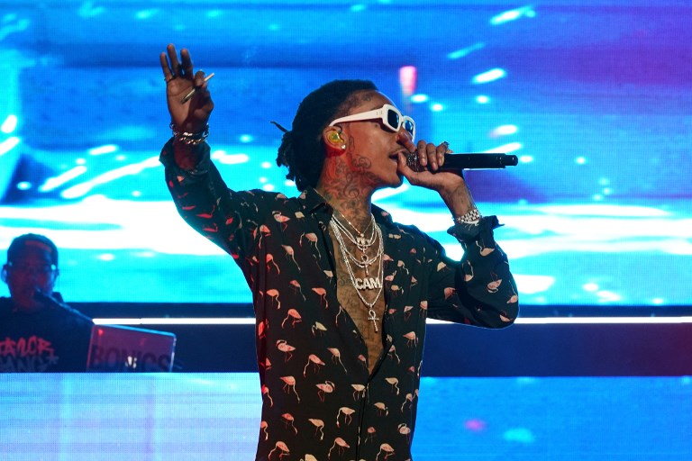 LOS ANGELES, CA - JUNE 22: Recording artist Wiz Khalifa performs onstage at night one of the 2017 BET Experience STAPLES Center Concert, sponsored by Hulu, at Staples Center on June 22, 2017 in Los Angeles, California.   Bennett Raglin/Getty Images for BET/AFP