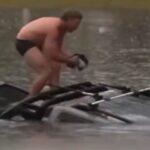 Video. Reporter htio snimiti poplavu pa uočio auto kako tone u bujici, odmah je skočio u vodu spasiti vozača